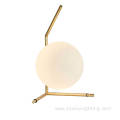 Gold simple metal brackets opal glass table lights